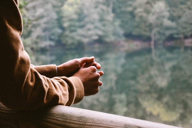 Man Thinking at Lake