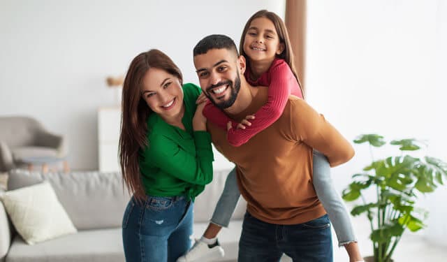 portrait of cheerful happy arab family having fun